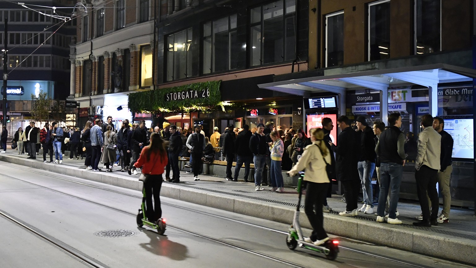 People out on the streets to celebrate the end of the COVID-19 restrictions, in Oslo, Saturday, Sept. 25, 2021. Police in Norway on Sunday reported dozens of disturbances and violent clashes including ...