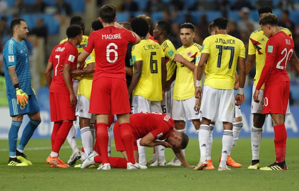 England and Colombia players argue during the round of 16 match between Colombia and England at the 2018 soccer World Cup in the Spartak Stadium, in Moscow, Russia, Tuesday, July 3, 2018. (AP Photo/Ri ...