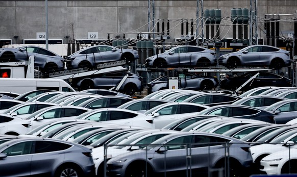 epa11961058 Tesla cars are parked at the Tesla factory in Gruenheide, near Berlin, Germany, 13 March 2025. According to figures from the German Federal Motor Transport Authority (KBA), only 1,429 new  ...