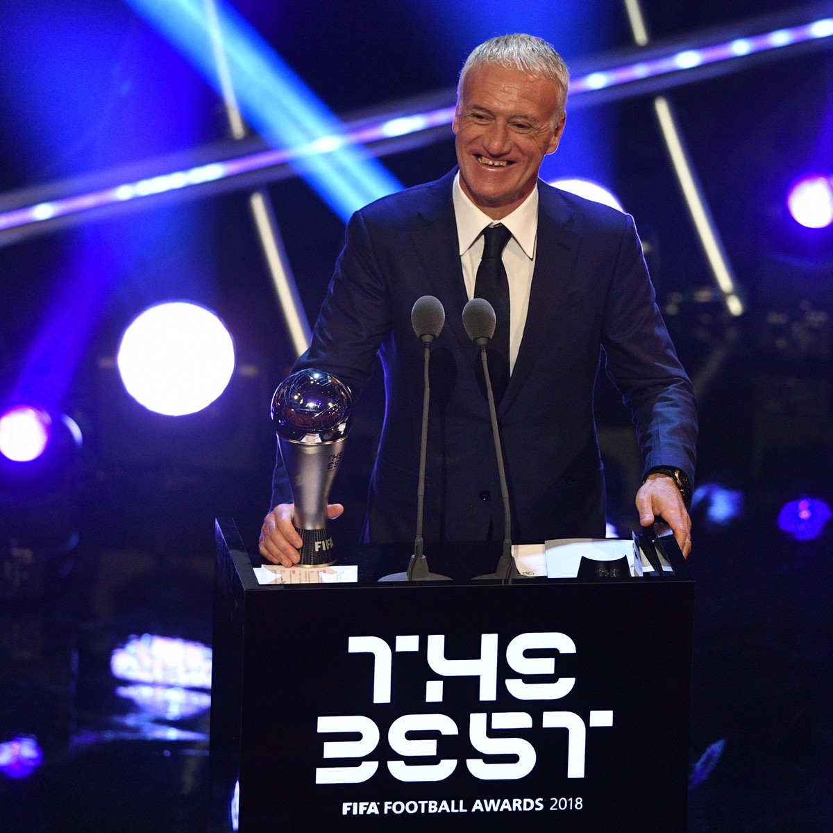 epa07044055 French national team head coach Didier Deschamps receives the Best FIFA Men's Coach award during the Best FIFA Football Awards 2018 in London, Great Britain, 24 September 2018. EPA/NE ...