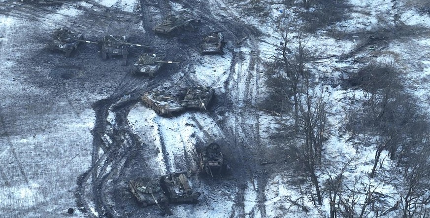 In this image from Ukrainian Armed Forces and taken in Feb. 2023 shows damaged Russian tanks in a field after attempting to attack, Vuhledar, Ukraine. The battle for the small coal-mining town of Vuhl ...