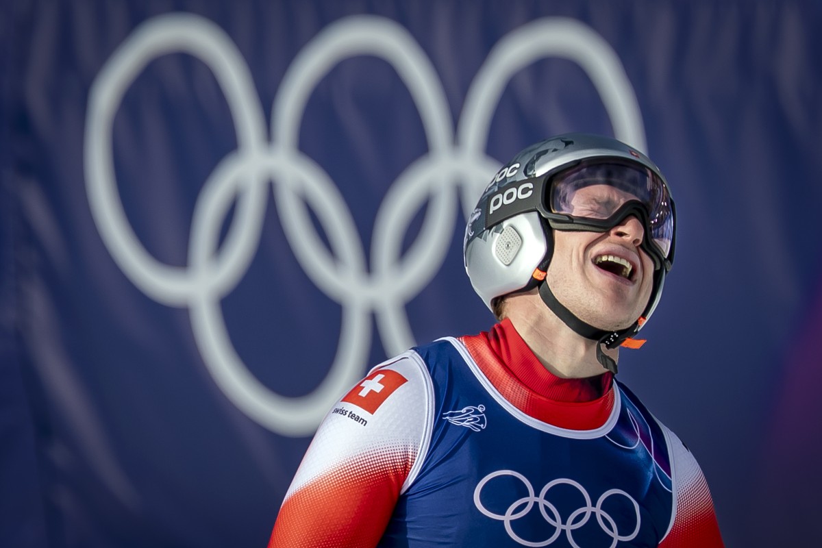 epa12713306 Switzerland's Marco Odermatt reacts in the finish area during the men's alpine skiing downhill race at the 2026 Olympic Winter Games at the Stelvio Ski centre in Bormio, Italy, 0 ...
