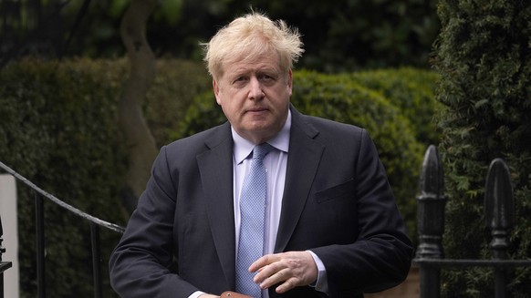 Boris Johnson leaves his home in London, Wednesday, March 22, 2023. Former British Prime Minister Boris Johnson, who was fined for breaching his own government's pandemic lockdown rules, is…