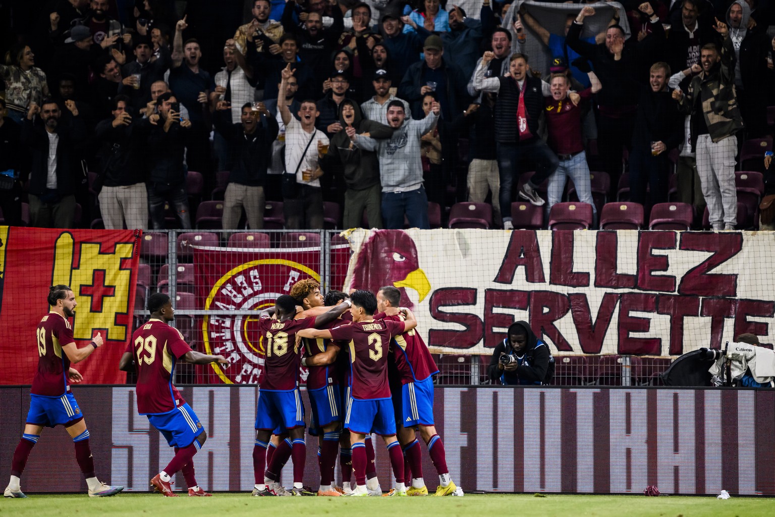 Servette&#039;s soccer players celebrate the 1:1 goal scoring by Servette&#039;s defender Steve Rouiller during the UEFA Champions League Second qualifying round first leg soccer match between Switzer ...
