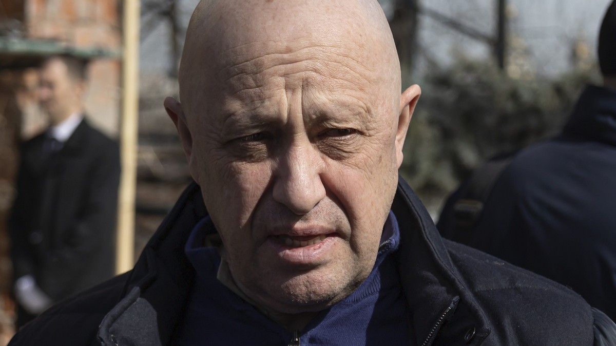 Yevgeny Prigozhin, the owner of the Wagner Group military company, arrives to pay the last respects to slain Russian military blogger Vladlen Tatarsky, during a funeral ceremony at the Troyekurovskoye ...