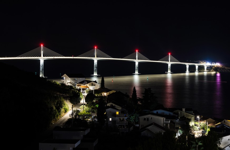 epa10092940 A view of Peljesac&#039; Bridge at Komarna village, during the opening ceremony, Croatia, 26 July 2022. Croatian authorities are opening the bridge with all day celebration and it will ope ...