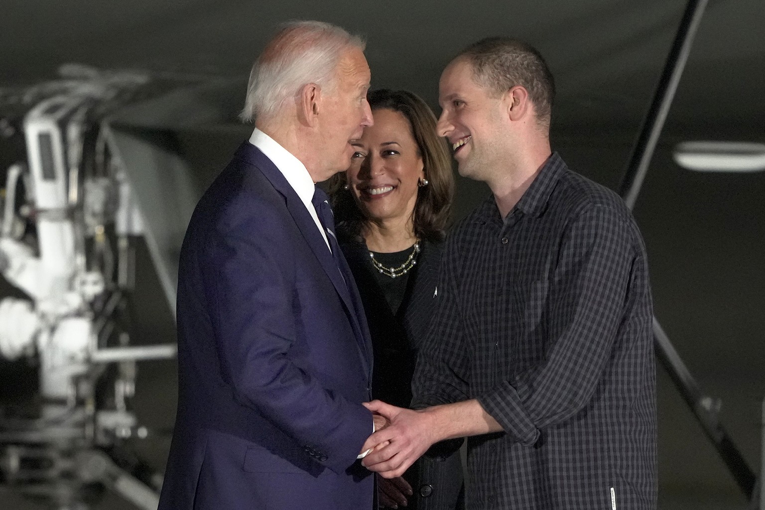 FILE - President Joe Biden, from left, and Vice President Kamala Harris greet reporter Evan Gershkovich at Andrews Air Force Base, Md., following his release as part of a 24-person prisoner swap betwe ...