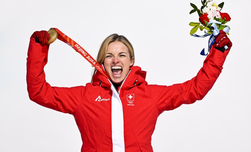 epa09745746 Gold medalist Lara Gut-Behrami of Switzerland celebrates during the victory ceremony of the Women&#039;s Super-G race of the Alpine Skiing events of the Beijing 2022 Olympic Games at the Y ...