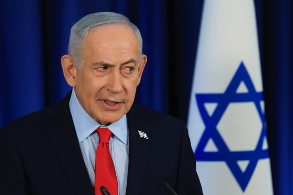 Israeli Prime Minister Benjamin Netanyahu speaks during a press conference in Jerusalem, Thursday, March 19, 2026. (Ronen Zvulun, Pool Photo via AP)
Israeli Prime Minister Benjamin Netanyahu holds a p ...