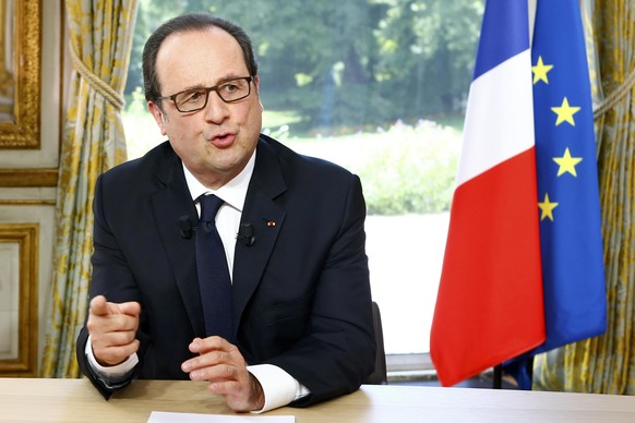 French President Francois Hollande gestures after a televised interview at the Elysee Palace where he said that France will not extend a state of emergency put in place after the November 2015 attacks ...