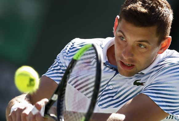 epa07434710 Filip Krajinovic of Serbia in action against Rafael Nadal of Spain during the BNP Paribas Open tennis tournament at the Indian Wells Tennis Garden in Indian Wells, California, USA, 13 Marc ...