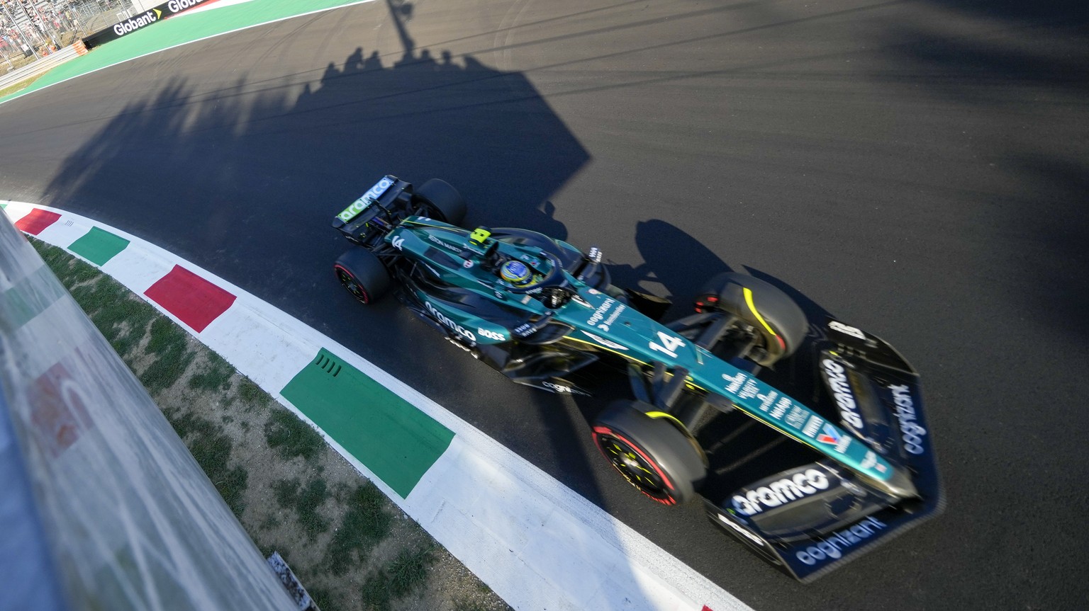 Aston Martin driver Fernando Alonso of Spain steers his car during the second free practice ahead of the Formula One Italian Grand Prix race at the Monza racetrack, in Monza, Italy, Friday, Aug. 30, 2 ...