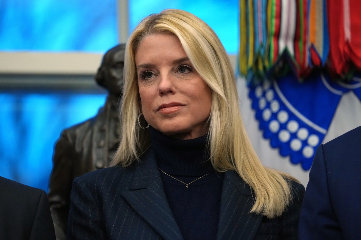 FILE - Attorney General Pam Bondi listens as President Donald Trump speaks at an event on addiction recovery in the Oval Office of the White House, Jan. 29, 2026, in Washington. (AP Photo/Allison Robb ...
