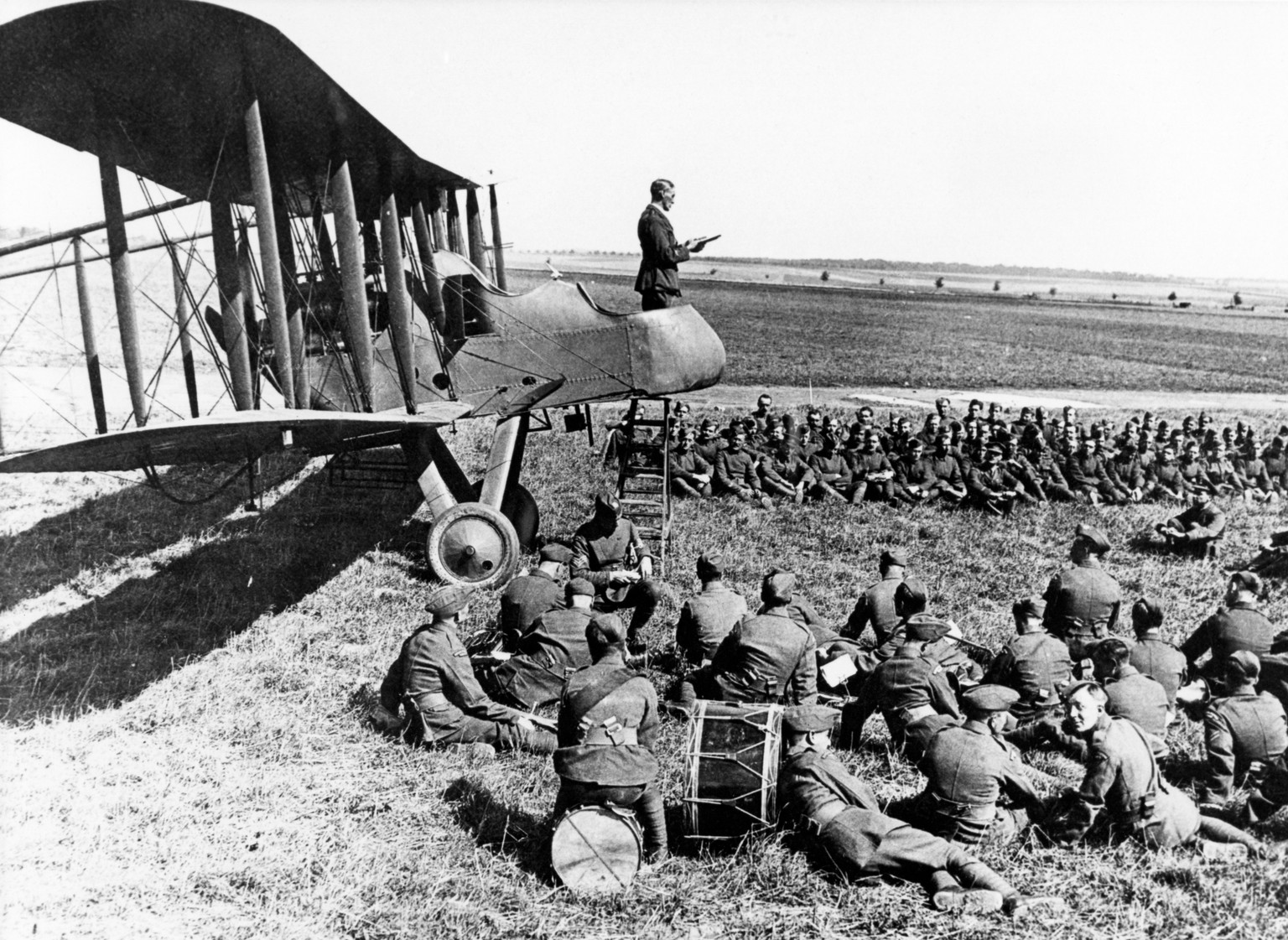 epa06641581 A handout provided by the Air Historical Branch-RAF (Royal Air Force) and taken on 01 September 1918 shows a padre uses the observer&#039;s cockpit of an FE.2b aircraft, as his pulpit duri ...