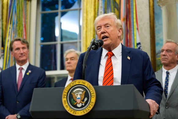 President Donald Trump speaks in the Oval Office of the White House, Friday, Oct. 10, 2025, in Washington, as Virginia Gov. Glenn Youngkin, Centers for Medicare &amp; Medicaid Services administrator D ...