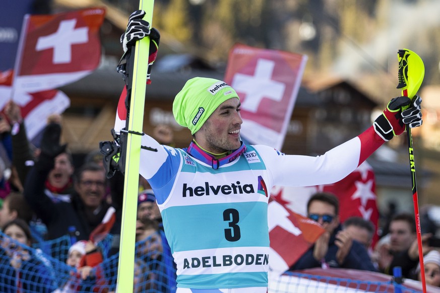 Winner Daniel Yule of Switzerland celebrates on his way to the podium after the men&#039;s slalom FIS World Cup race in Adelboden, Switzerland, Sunday, January 12, 2020. (KEYSTONE/Peter Klaunzer)