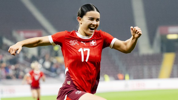 epa11691310 Switzerland's midfielder Naomi Luyet, celebrates after scoring the 2:1 goal during the women's international friendly soccer match between Switzerland and France at the Stade de ...
