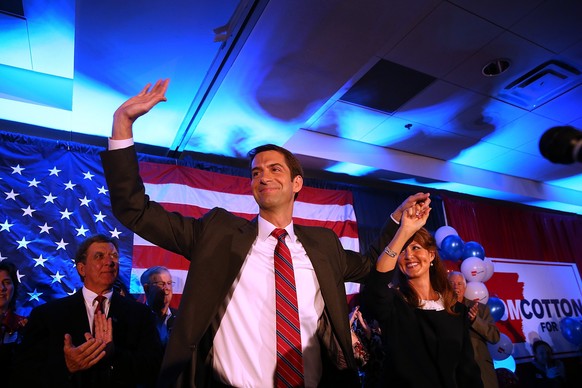 NORTH LITTLE ROCK, AR - NOVEMBER 04: U.S. Rep. Tom Cotton (R-AR) and republican U.S. Senate elect in Arkansas greets supporters with his wife Anna Peckham during an election night gathering on Novembe ...