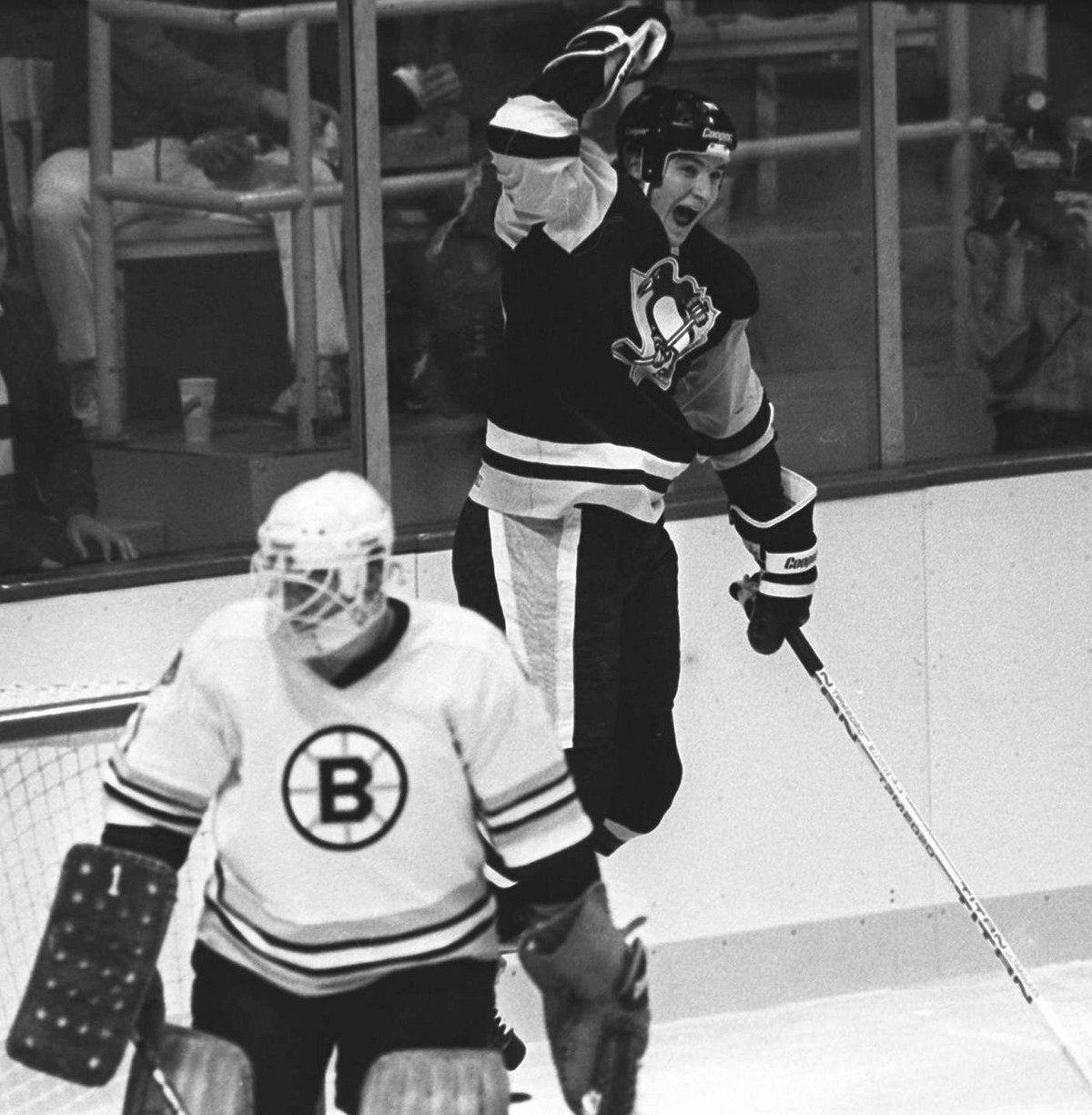 Pittsburgh Penguins' Mario Lemieux reacts after scoring his first NHL hockey goal against Boston Bruins goalie Pete Peters in Boston, Oct. 12, 1984. Penguins star and owner Mario Lemieux, one of  ...