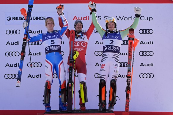 From left, second place finisher France&#039;s Clement Noel, first place finisher Austria&#039;s Manuel Feller and third place finisher Germany&#039;s Linus Strasser pose on the podium after a men&#03 ...