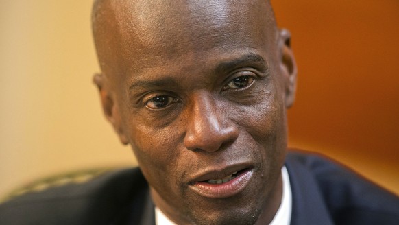 FILE - Haiti&#039;s President Jovenel Moise speaks during an interview at his home in Petion-Ville, a suburb of Port-au-Prince, Haiti, Feb. 7, 2020. A former Haitian senator pleaded guilty on Tuesday, ...