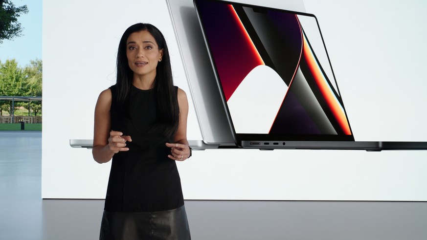 epa09530710 A handout photo made available by Apple Inc. showing Apple?s Shruti Haldea showcasing completely reimagined MacBook Pro powered by the brand new M1 Pro and M1 Max chips, during a special e ...
