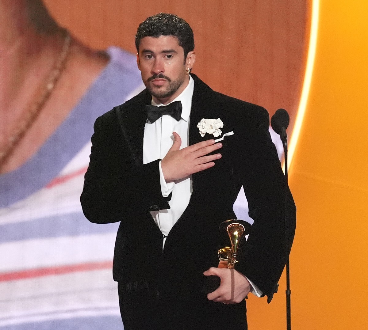 Bad Bunny accepts the award for album of the year for "DebÌ Tirar M·s Fotos" during the 68th annual Grammy Awards on Sunday, Feb. 1, 2026, in Los Angeles. (AP Photo/Chris Pizzello)
Bad Bunny