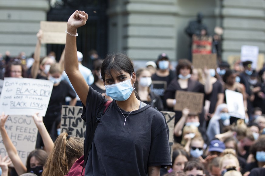 People demonstrate against racism after the worldwide movement of the Black Lives Matter (BLM) protest against the recent death of George Floyd in Bern, Switzerland, Saturday, 13 June 2020. Floyd, a 4 ...