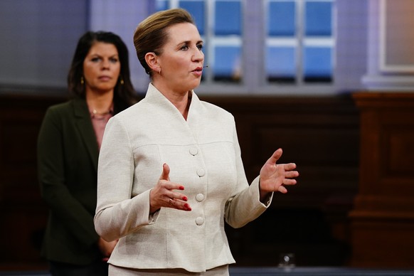 epa10277592 Danish Prime Minister from the Social Democrats Mette Frederiksen and leader of The Alternative Franciska Rosenkilde during the party leader debate in the Common Hall at Christiansborg in  ...