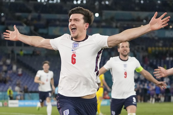 England&#039;s Harry Maguire celebrates after scoring his side&#039;s second goal during the Euro 2020 soccer championship quarterfinal match between Ukraine and England at the Olympic stadium in Rome ...