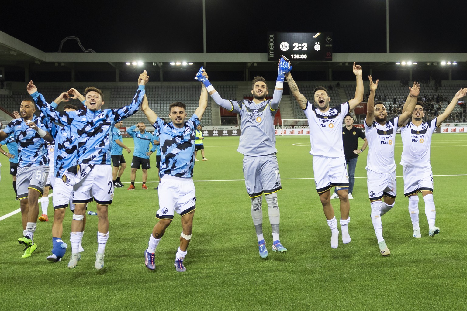 Lugano&#039;s players celebrate after the UEFA Europa League qualifying third round second leg match between Switzerland&#039;s FC Lugano and Serbia&#039;s Partizan Belgrade at the Stockhorn Arena in  ...