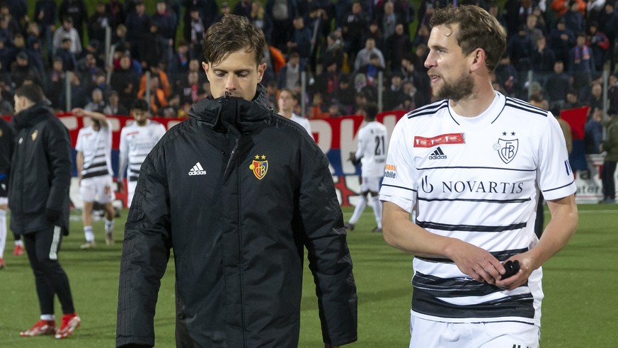 Basel&#039;s players midfielder Valentin Stocker, left, and midfielder Fabian Frei, right, look disappointed after losing against Etoile Carouge team, during the Swiss Cup Round of 16 between Etoile C ...