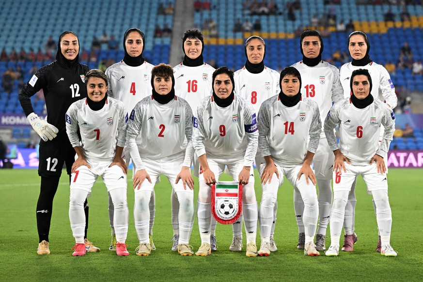 Iran players pose for a team photo ahead of the Women's Asia Cup soccer match between Iran and South Korea on the Gold Coast, Australia, Monday, March 2, 2026. (Dave Hunt/AAPImage via AP)/AAP Ima ...
