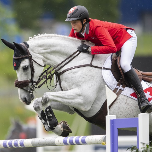 Martin Fuchs from Switzerland on Leone Jei at the &quot;Longines FEI Jumping Nations Cup of Switzerland&quot; during the CSIO Show Jumping in St. Gallen, Switzerland, Sunday, June 6, 2021. (KEYSTONE/E ...