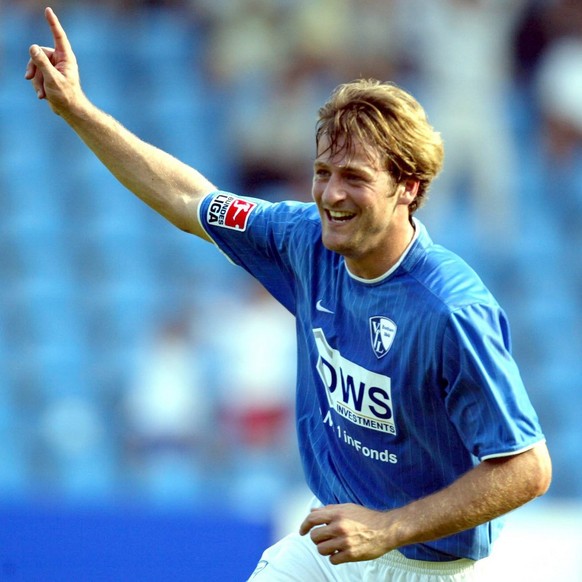 BOC07 - 20020817 - BOCHUM, GERMANY : Danish striker Thomas Christiansen of VfL Bochum celebrates his third goal against Energie Cottbus during their German Bundesliga soccer match in Bochum, Saturday  ...