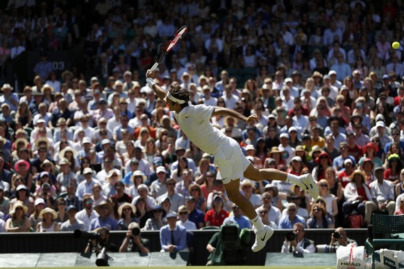 Britain Tennis - Wimbledon - All England Lawn Tennis &amp; Croquet Club, Wimbledon, England - 6/7/16 Switzerland&#039;s Roger Federer in action against Croatia&#039;s Marin Cilic REUTERS/Paul Childs