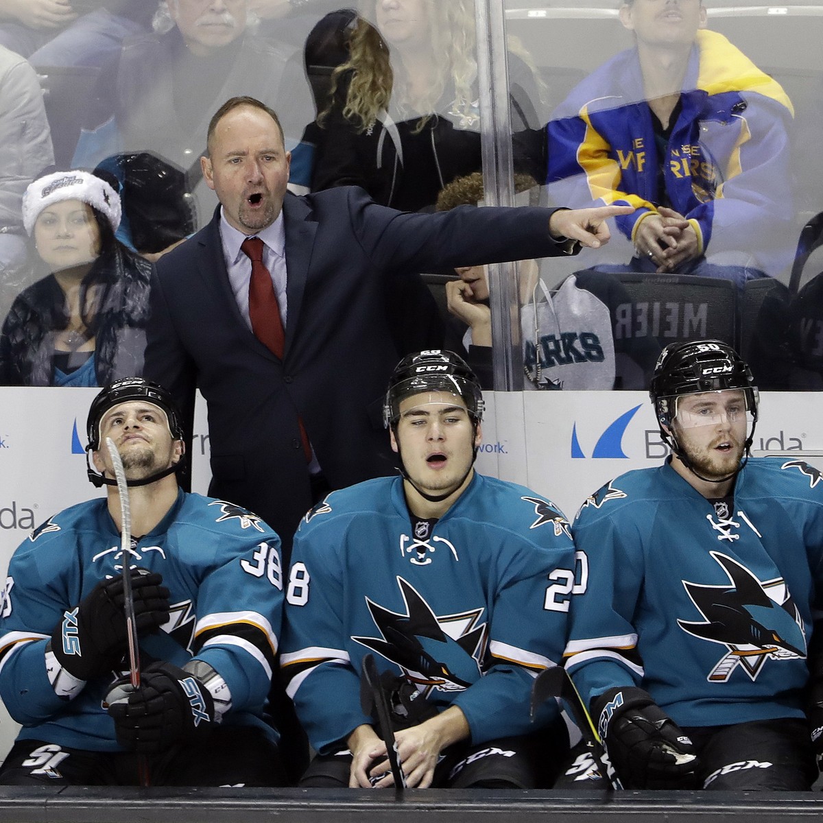 San Jose Sharks coach Peter DeBoer, top, argues a call during the first period of the team's NHL hockey game against the Edmonton Oilers on Friday, Dec. 23, 2016, in San Jose, Calif. (AP Photo/Ma ...