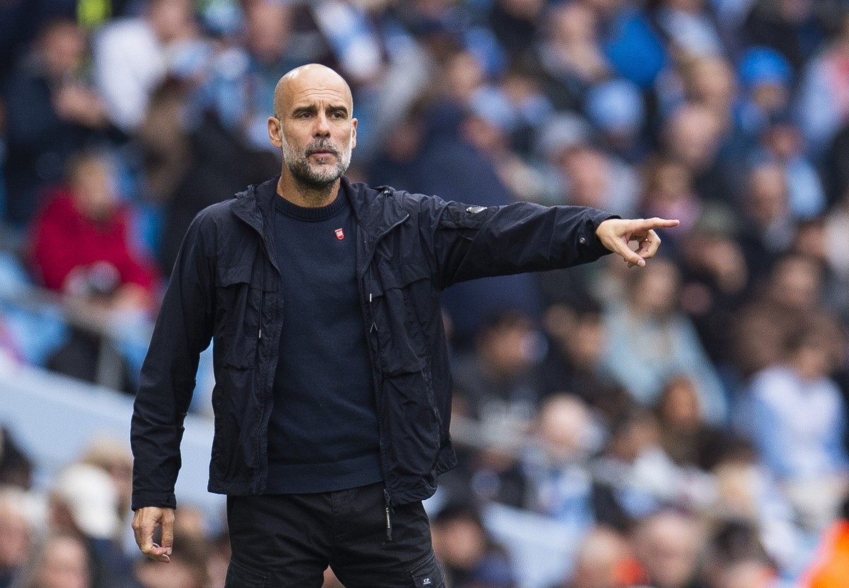 epa12983430 (FILE) - Manchester City manager Pep Guardiola gestures during the English Premier League soccer match between Manchester City and Burnley FC, in Manchester, Britain, 27 September 2025 (re ...