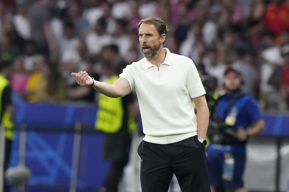 FILE - England&#039;s manager Gareth Southgate gives instructions during the final match between Spain and England at the Euro 2024 soccer tournament in Berlin, Germany, Sunday, July 14, 2024. (AP Pho ...