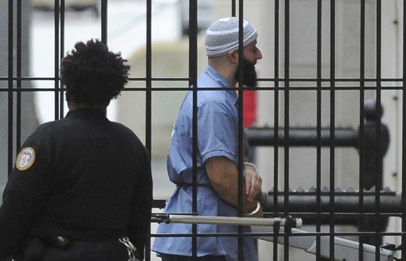 FILE - In this Feb. 3, 2016 file photo, Adnan Syed enters Courthouse East prior to a hearing in Baltimore. Baltimore prosecutors and attorneys for Syed, a Maryland man whose murder conviction was chro ...