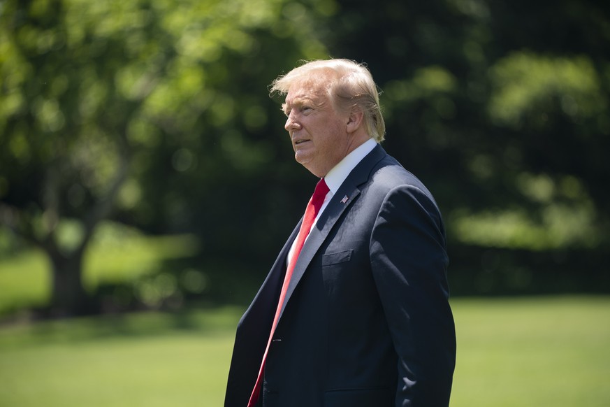 epa07597840 US President Donald J. Trump departs after speaking to the media on his way from the White House to Japan in Washington, DC, USA, 24 May 2019. Trump said he was sending an additional 1,500 ...