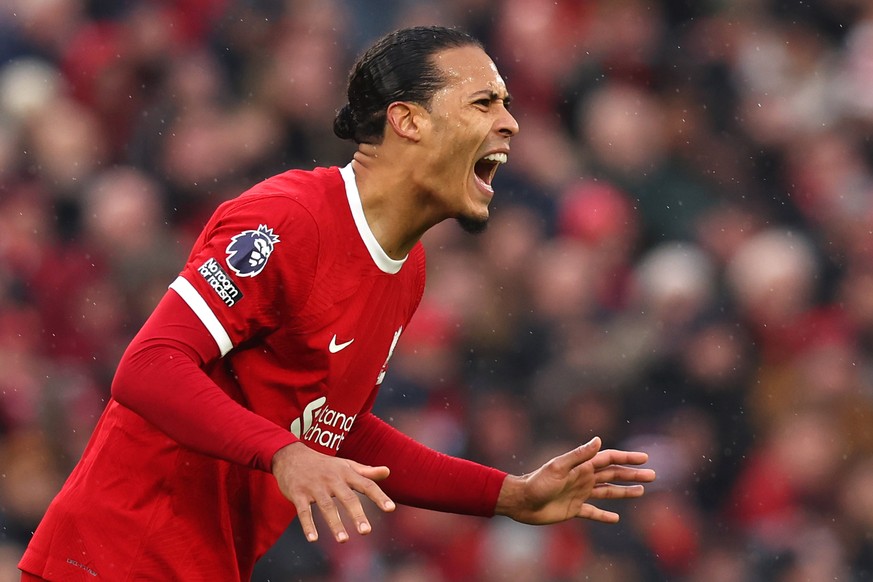 epa11211788 Virgil van Dijk of Liverpool FC reacts during the English Premier League match between Liverpool FC and Manchester City, at Anfield, Liverpool, Britain, 10 March 2024. EPA/ASH ALLEN EDITOR ...