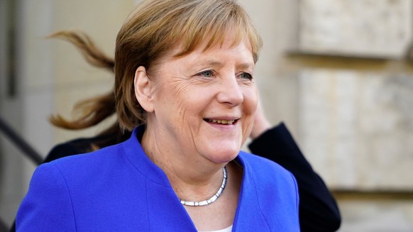 epa06858191 German Chancellor Angela Merkel of the Christian Democratic Union (CDU), leaves the Reichstag building, the seat of German Bundestag, in Berlin, Germany, 02 July 2018. According to media r ...