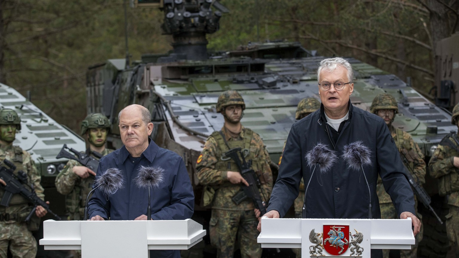 Lithuania&#039;s President Gitanas Nauseda, right, speaks during a joint media conference with German Chancellor Olaf Scholz during the Lithuanian-German military exercise &#039;Grand Quadriga&#039; a ...