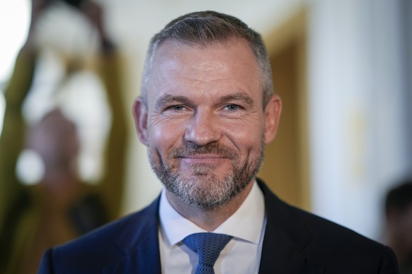 Former Slovak Prime Minister Peter Pellegrini smiles as he addresses the media after voting at a polling station in Bratislava, Slovakia, Saturday, Sept. 30, 2023. Slovakia holds an early parliamentar ...