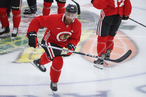 Chicago Blackhawks defenseman Calvin de Haan skates during NHL hockey practice at Fifth Third Arena on Monday, July 13, 2020, in Chicago. (AP Photo/Kamil Krzaczynski)