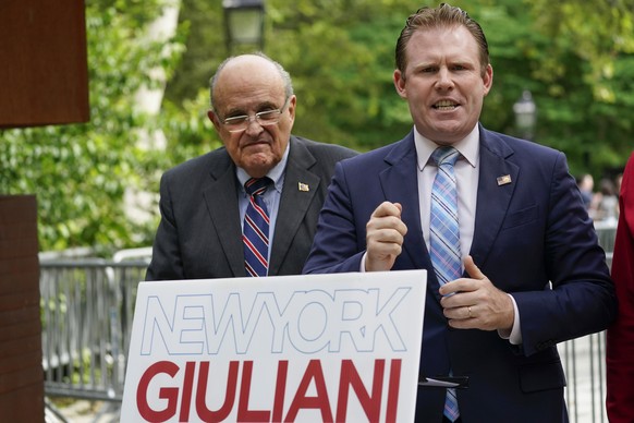 FILE - Andrew Giuliani, right, a Republican candidate for Governor of New York, is joined by his father, former New York City mayor Rudy Giuliani, during a news conference, June 7, 2022, in New York.  ...