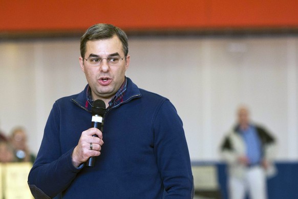 FILE - In this Thursday, Feb. 23, 2017 file photo, U.S Rep. Justin Amash, R-Cascade Township, speaks to the audience during a town hall meeting at the Full Blast Recreation Center in Battle Creek, Mic ...