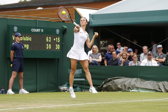 Viktorija Golubic of Switzerland in action during her first round match against Shuai Zhang of China, at the Wimbledon Championships at the All England Lawn Tennis Club, in London, Britain, 04 July 20 ...