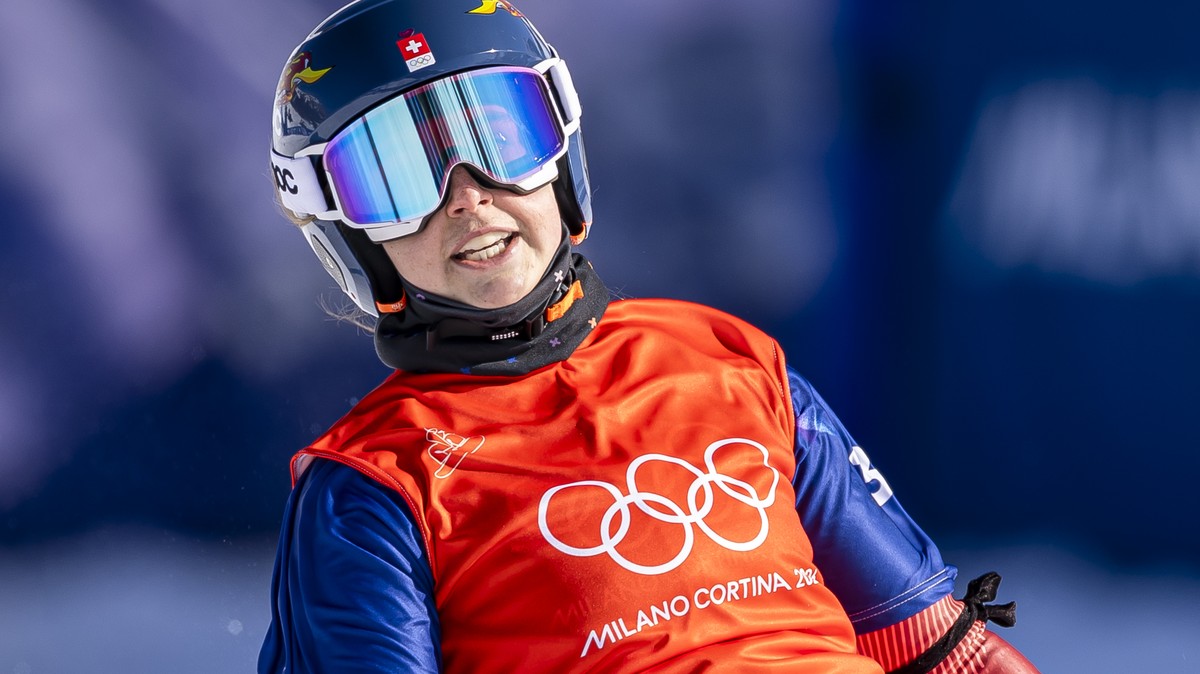 Noemie Wiedmer of Switzerland reacts after the quarter final in the women's snowboard cross event at the 2026 Olympic Winter Games in Livigno, Italy, on Friday, February 13, 2026. (KEYSTONE/Peter ...